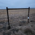 barbed wire farm fence