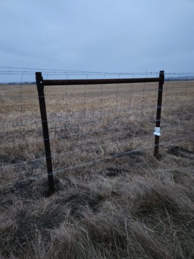 barbed wire farm fence