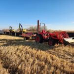 tractor with wooden posts for fencing