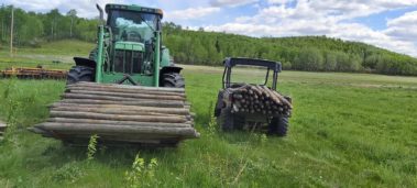wooden post for a fence on a farm or acreage